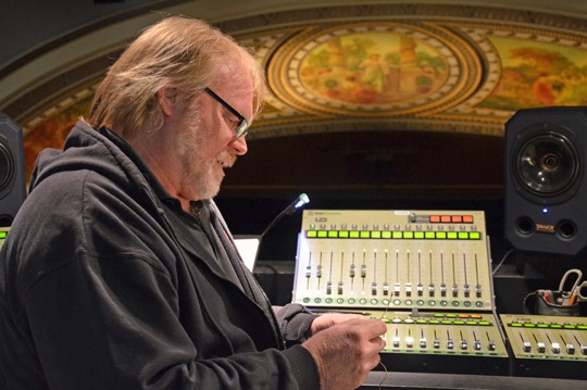 Jim Neil holds one of his E6 Earsets. 